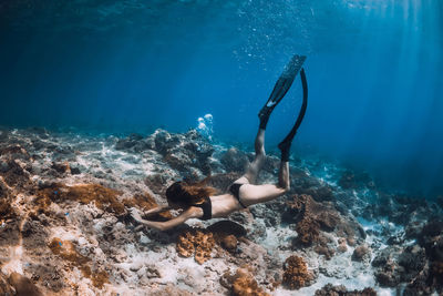 Man swimming in sea