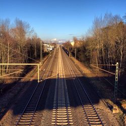 Railroad track against sky