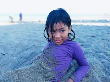 Portrait of smiling girl on beach