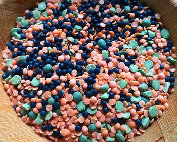 High angle view of multi colored candies on table