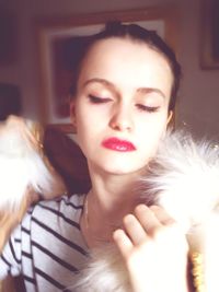Portrait of beautiful woman at home
