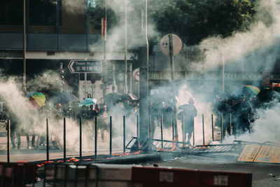 Smoke emitting from glass in city