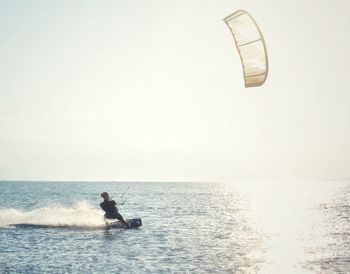 Man kitesurfing