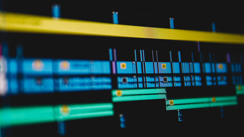 Low angle view of illuminated lighting equipment