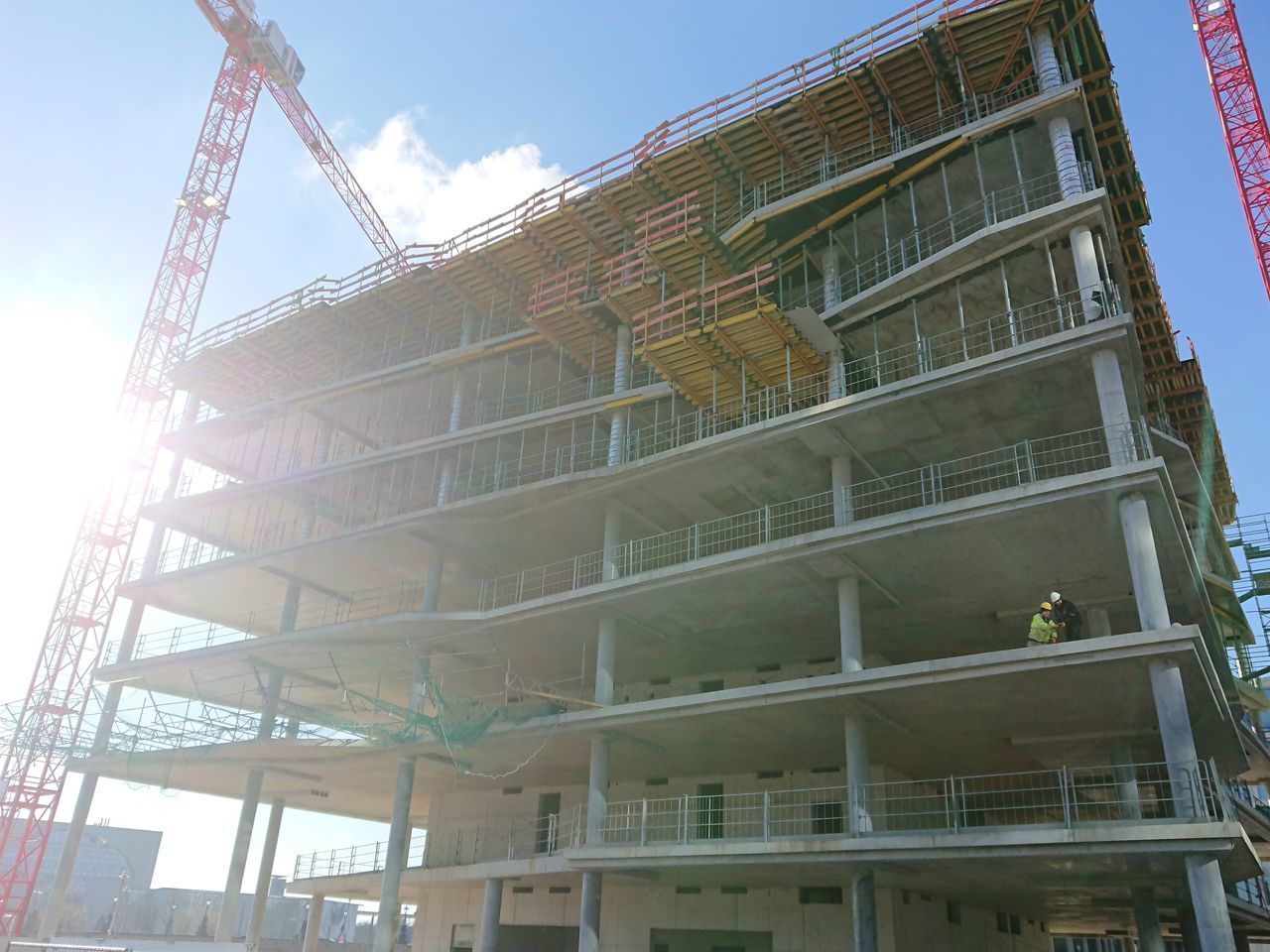 LOW ANGLE VIEW OF CRANE AT CONSTRUCTION SITE