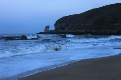 Scenic view of sea against clear sky