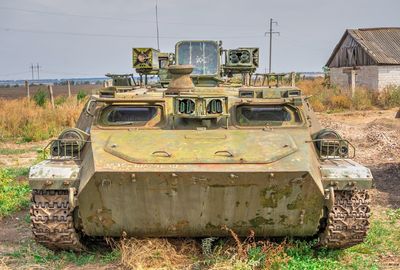 Abandoned truck on field