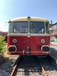 Train on railroad track against sky