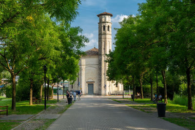 View of trees and buildings against sky