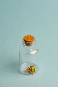 Close-up of glass of jar on table