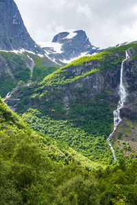 Norway landscape with big waterfall. waterfall in mountains of norway.