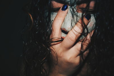 Close-up of woman with face mask