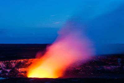 Blurred motion of woman against blue sky