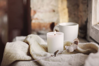 Close-up of illuminated candle