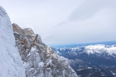 Scenic view of snow covered mountain against sky