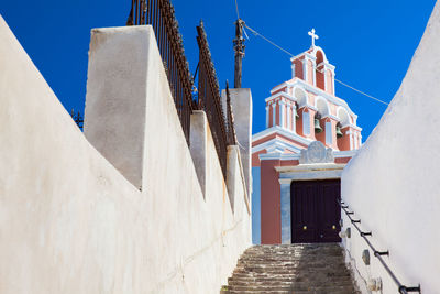 Bell tower of the catholic monastery of dominican nuns at fira city in santorini