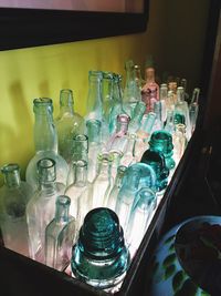 Close-up of bottles on shelf