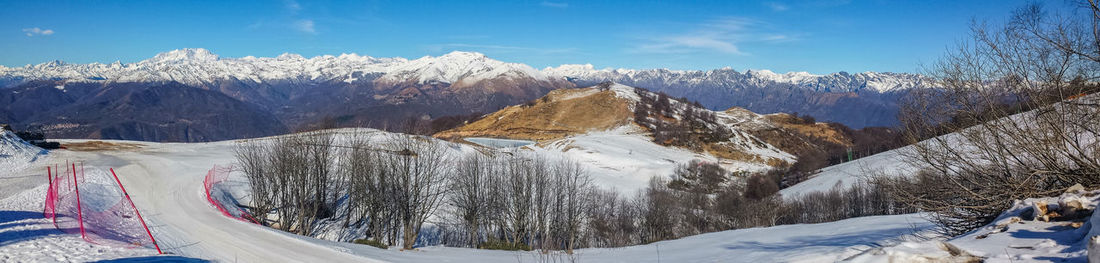 Wide angle view on the italian and swiss alps from mottarone