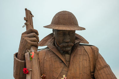 Low angle view of statue against the sky