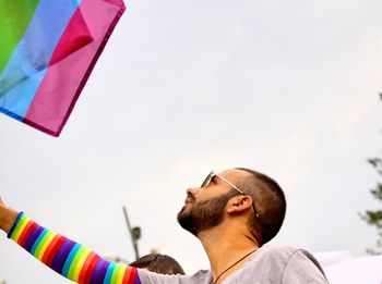 Low angle view of man against sky