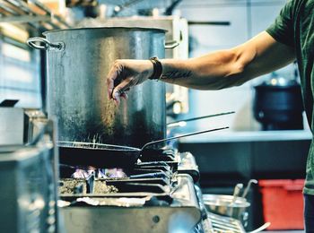 Woman working in kitchen