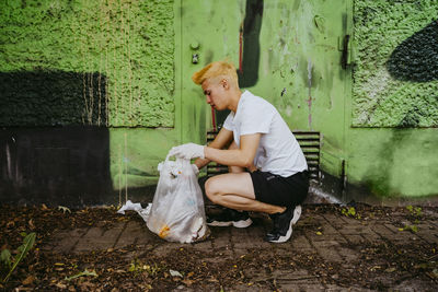 Rear view of woman with dog