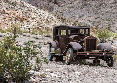 Abandoned truck on field