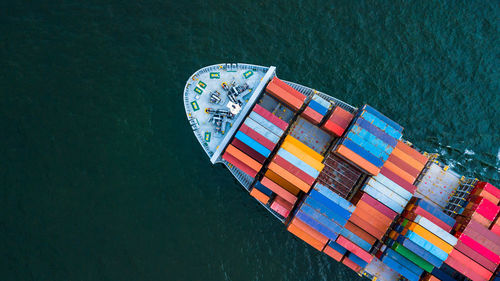 Aerial view of container ship in sea