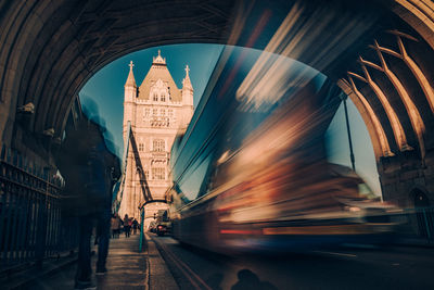Blurred motion of vehicles on tower bridge in city