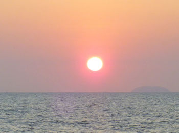 Scenic view of sea at sunset