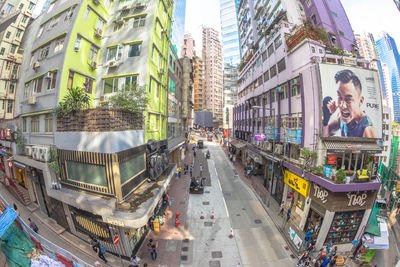 Panoramic view of vehicles on city street