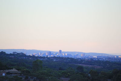View of cityscape against clear sky