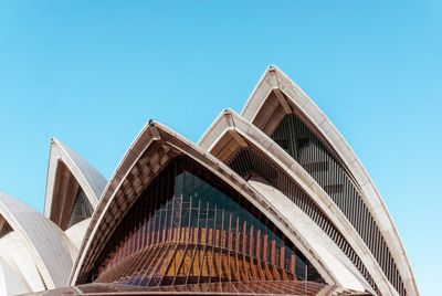 Low angle view of building against blue sky