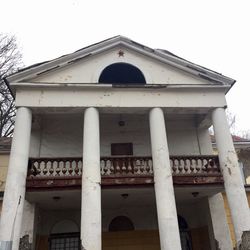 Low angle view of old building against sky