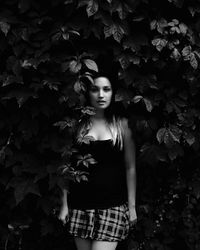 Beautiful young woman with arms outstretched