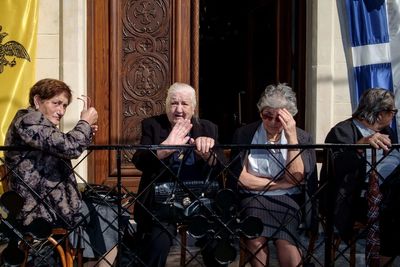 Group of people sitting outdoors