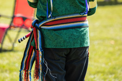 Rear view of person with rope