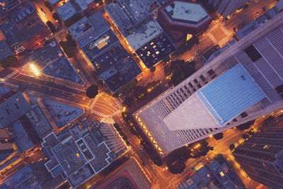 High angle view of illuminated buildings in city at night