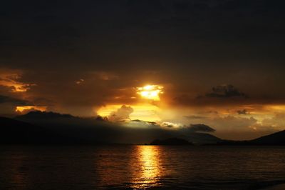 Scenic view of sea at sunset