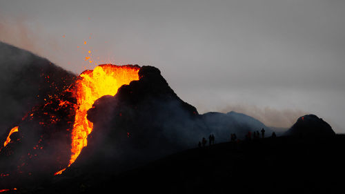 Scenic view of volcanic mountain against sky