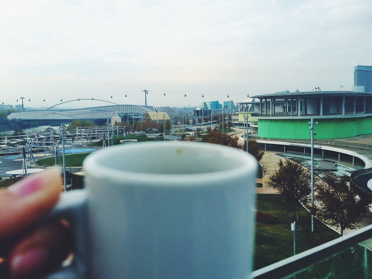 drink, person, food and drink, refreshment, coffee cup, holding, lifestyles, leisure activity, sky, part of, men, coffee - drink, cropped, unrecognizable person, cup, table