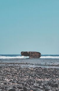 Scenic view of sea against clear sky