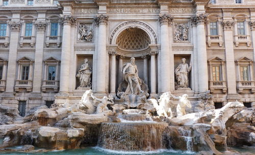 Fountain in front of historical building