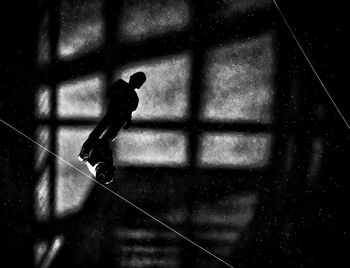 View of people walking through window