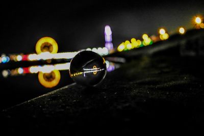 Close-up of illuminated lights at night