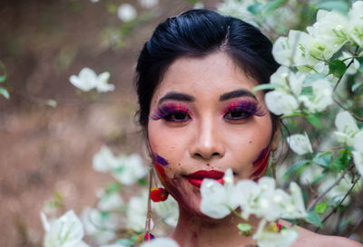 Portrait of woman with face paint