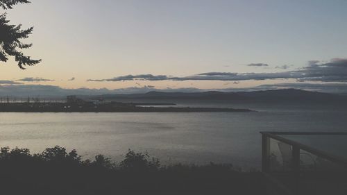 Scenic view of sea against sky at sunset