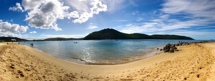 Panoramic view of beach against sky