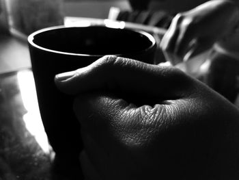 Close-up of human hand holding drink