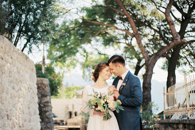 Portrait of bride holding bouquet